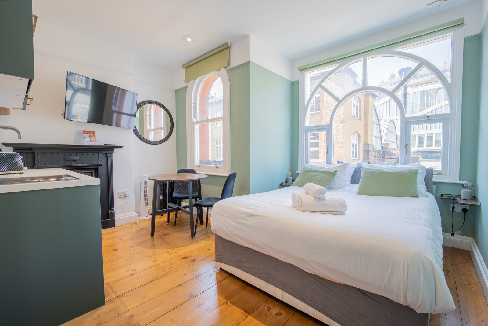The York studio bedroom with arched windows